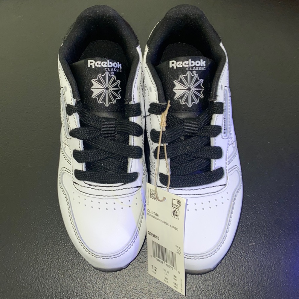 Kids Unisex White and black Reebok Classics.